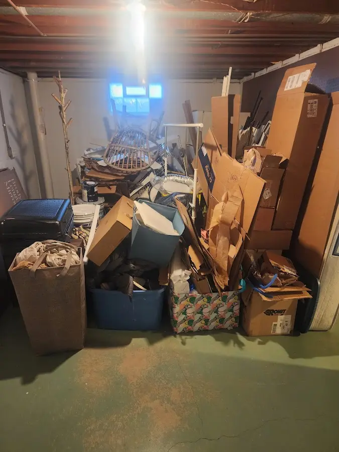 Roll-off dumpster container at job site for 20 Yard Dumpster Rental in Brigham City